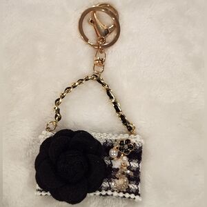 Elegant Black and Gold °5 Keychain with Floral Accent Bag Charm